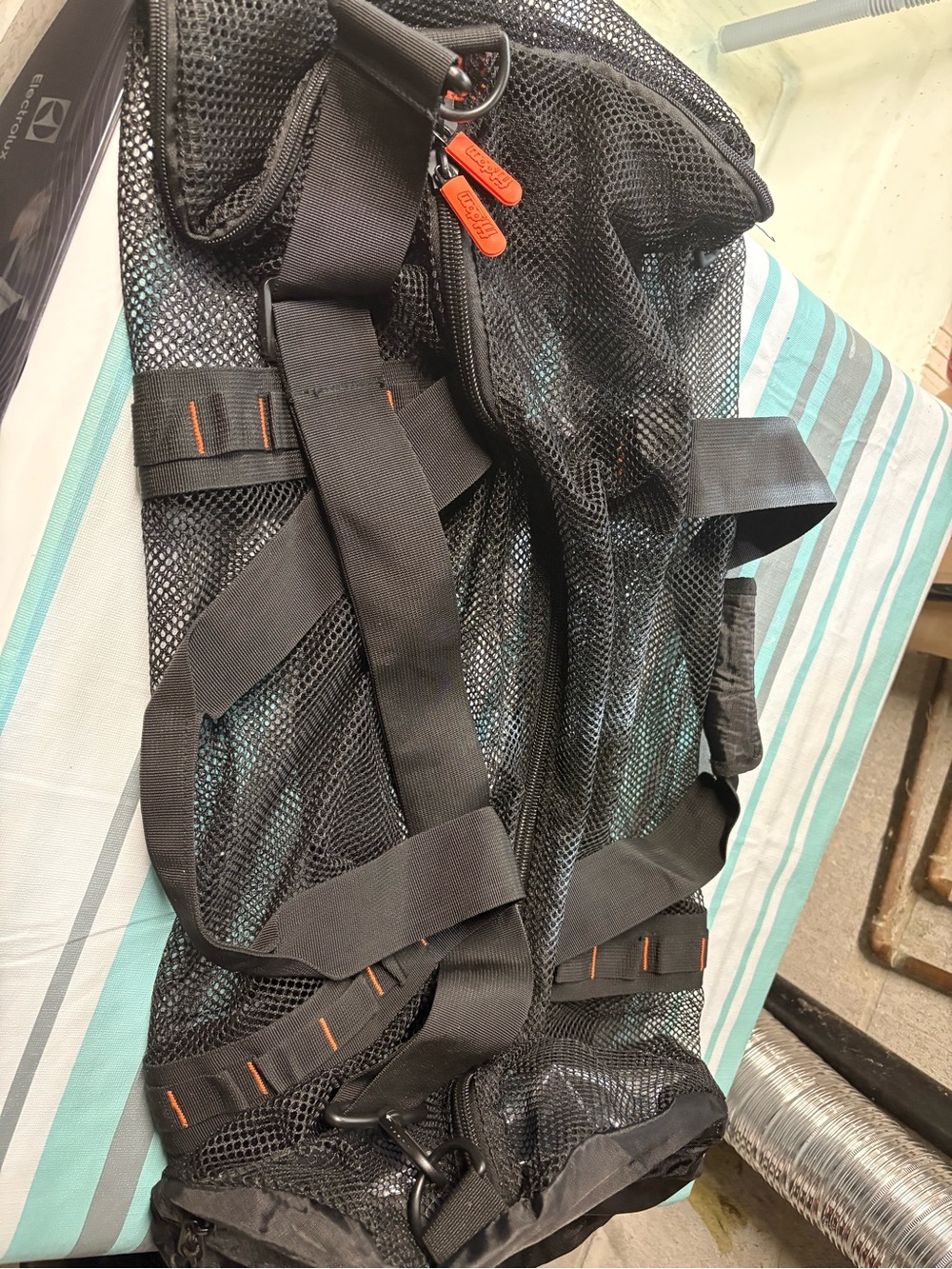 Black Mesh Gear Bag with Orange Zipper Pulls
